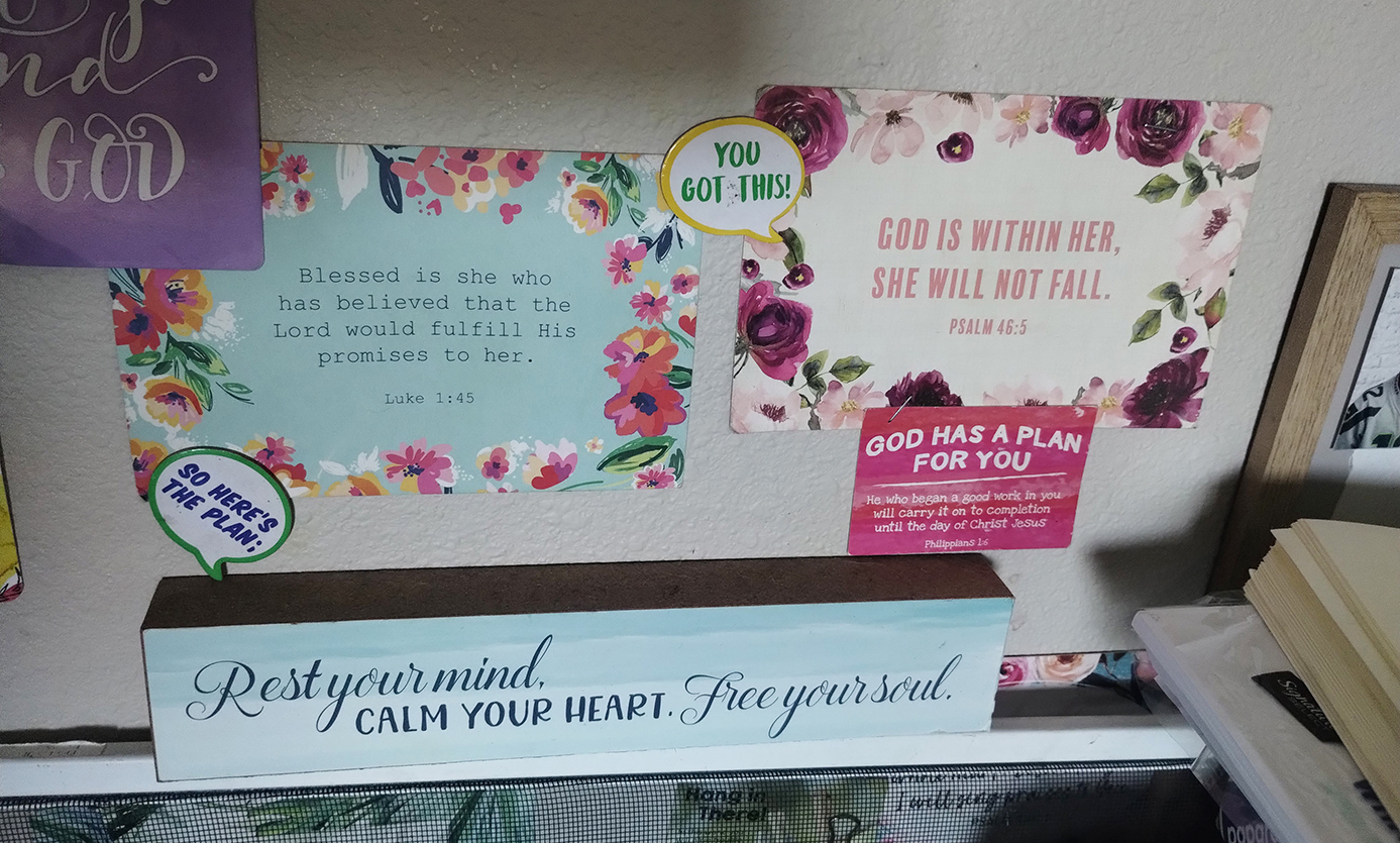 Photo of Marquita's wall with prayers and inspirational images