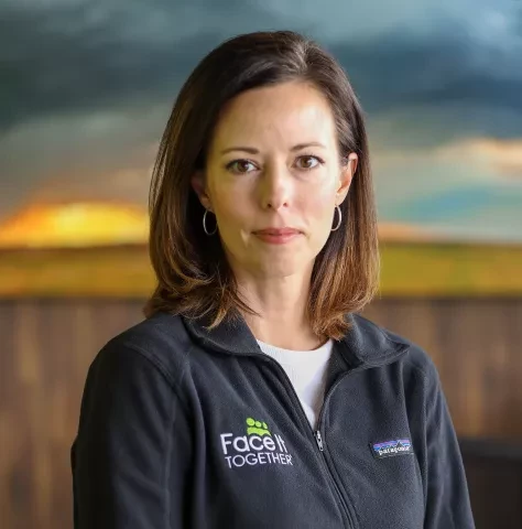 Photo of woman with shoulder-length brown hair