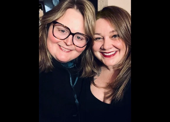 Closeup photo of two women smiling