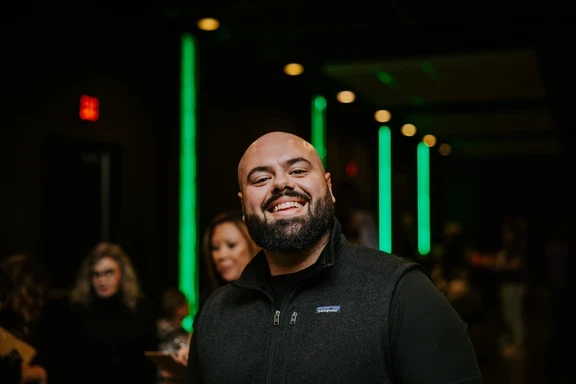 Photo of man smiling at camera